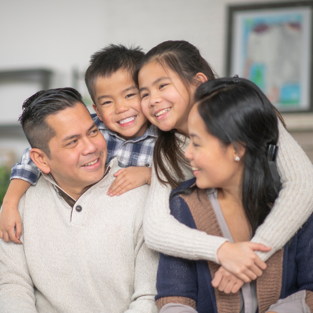 Happy family in their home