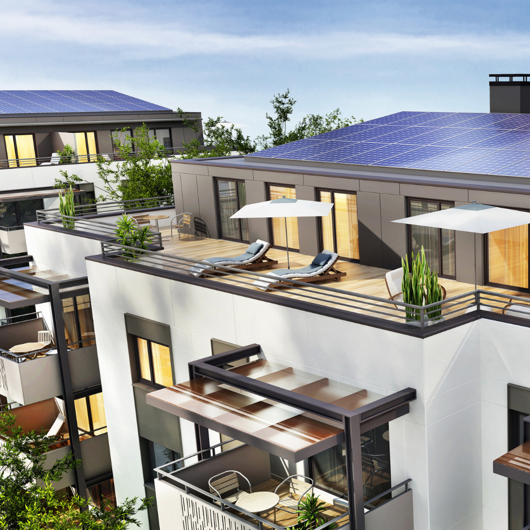 Modern sustainable housing with solar panels and rooftop terraces